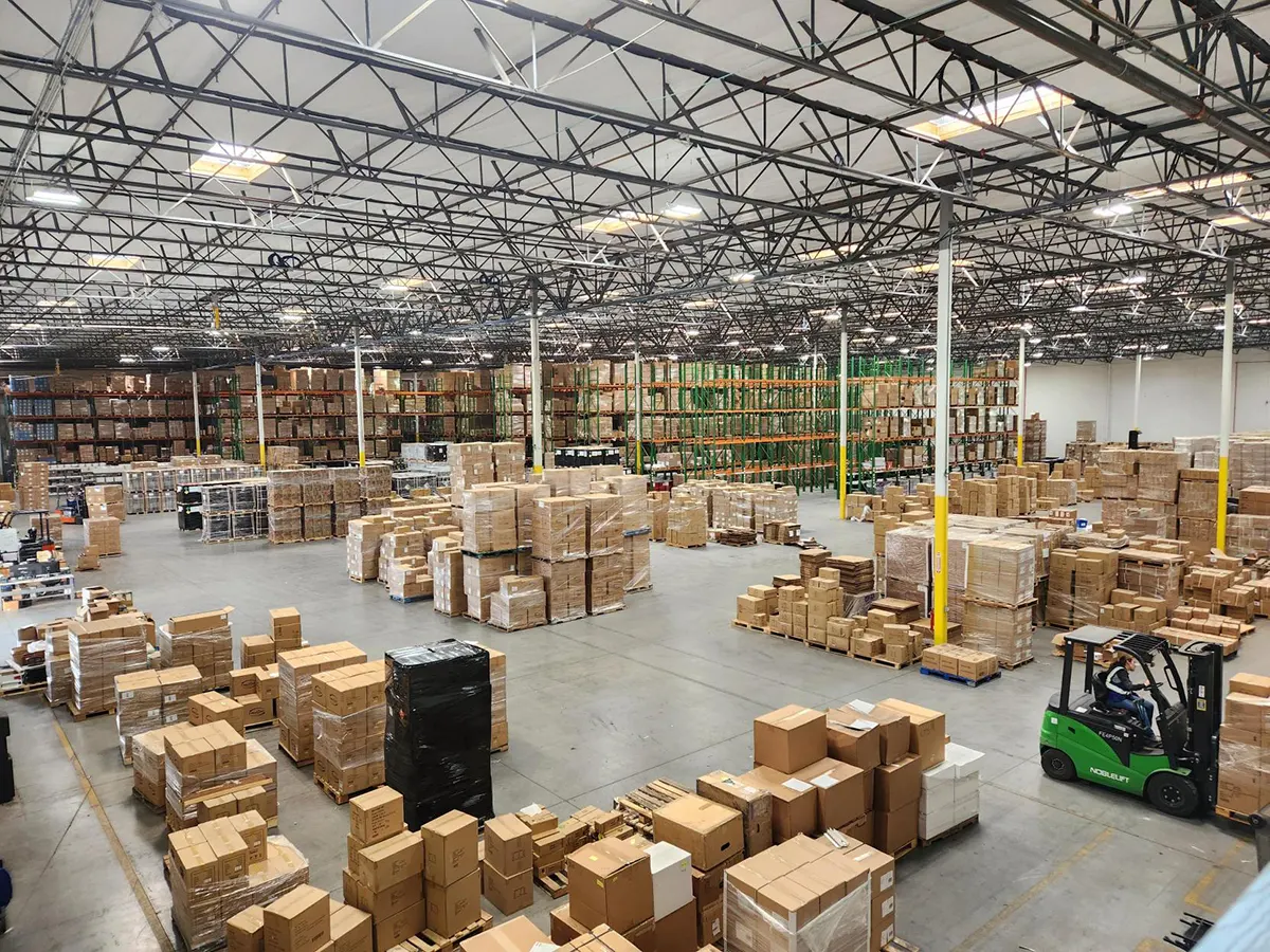 GLC Distribution Los Angeles Warehouse and Fulfillment Facility Interior of GLC Distribution’s Los Angeles-area warehouse facility with palletized inventory, storage racks, and forklift activity supporting warehousing and fulfillment operations.